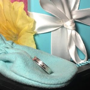 Tiffany & Co 1837 channel ring size 4